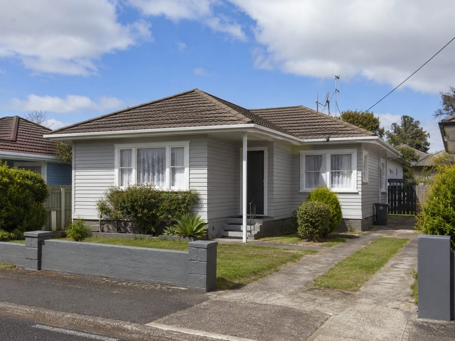 Traditional Auckland bungalow with a low-pitched hip roof